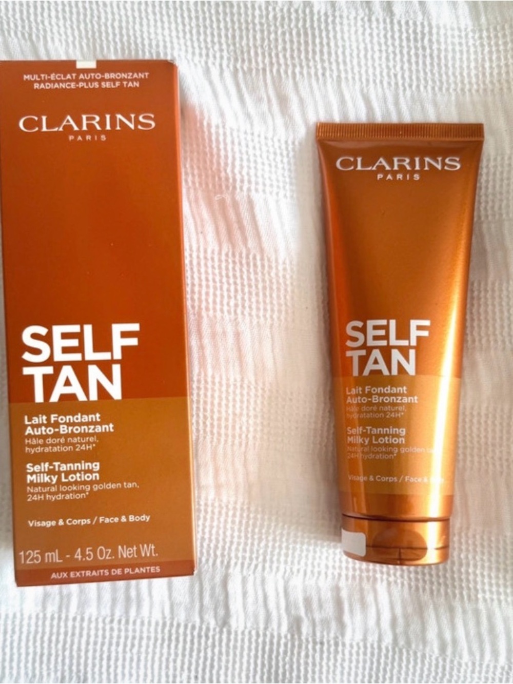 NEW- Clarins Self Tan Milky Lotion - Orange Bronze Packaging